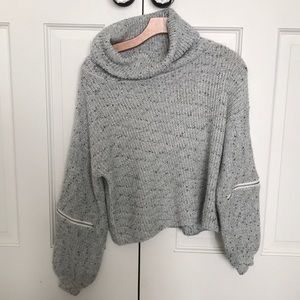 Turtleneck with zipper elbow detail